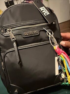 😳Black MADDEN NYC Backpack with Colorful Tassel Charm☺️